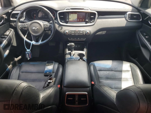 2016 Kia Sorento SX z VIN 5XYPK4A50GG008162, wystawiony jako Copart lot #55602355 z przebiegiem 49 987 mil mil oraz Szkoda całkowita • Salvage title. Historia ofert i sprzedaży dostępna na DreamBid. Obrazek 8.