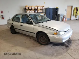 2002 Chevrolet Prizm z VIN 1Y1SK52862Z411433, wystawiony jako Copart lot #60319644 z przebiegiem 174 750 mil mil oraz Szkody całkowita. Historia ofert i sprzedaży dostępna na DreamBid. Obrazek 4.