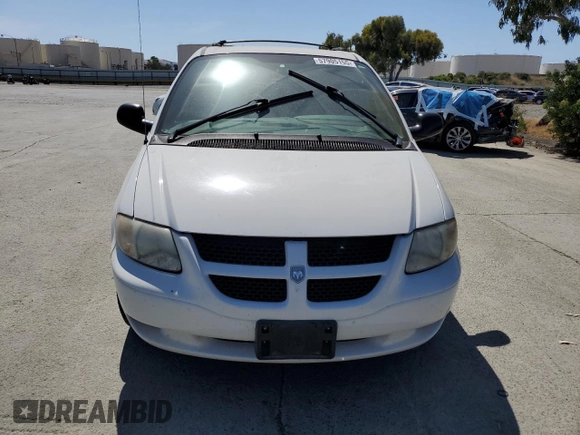 2003 Dodge Grand Caravan z VIN 2D4GP74L73R111228, wystawiony jako Copart lot #57905155 z przebiegiem 85 878 mil mil oraz Czysty tytuł • Clean title. Historia ofert i sprzedaży dostępna na DreamBid. Obrazek 5.