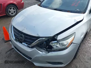 2016 Nissan Altima SV with VIN 1N4AL3AP0GC262897, listed as a IAAI auction lot 41063385 with 157,331 mi miles and . Bid and sale history available at DreamBid. Image 6.