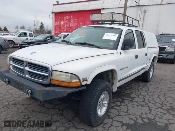 2000 Dodge Dakota Sport with VIN 1B7GG2AN2YS760690, listed as a IAAI auction lot 41616767 with 225,478 mi miles and . Bid and sale history available at carsss.com. Image 2.