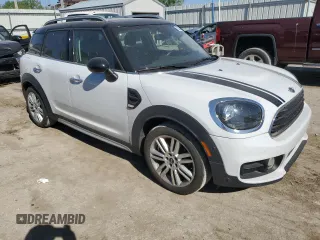 2019 MINI Countryman Cooper with VIN WMZYS7C59K3F46555, listed as a Copart auction lot 53354775 with 82,034 mi miles and Salvage title. Bid and sale history available at DreamBid. Image 4.
