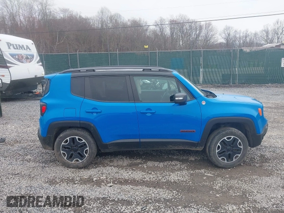 2015 Jeep Renegade Trailhawk with VIN ZACCJBCT4FPB41376, listed as a IAAI auction lot 41943388 with 65,963 mi miles and . Bid and sale history available at DreamBid. Image 14.