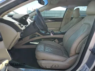2013 Lincoln MKZ z VIN 3LN6L2G94DR820729, wystawiony jako Copart lot #53243145 z przebiegiem 111 753 mil mil oraz Szkoda całkowita • Salvage title. Historia ofert i sprzedaży dostępna na DreamBid. Obrazek 7.