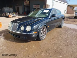 2003 Jaguar S-Type with VIN SAJEA01T43FM88318, listed as a IAAI auction lot 41290433 with 1 mi miles. Bid and sale history available at carsss.com. Image 2.