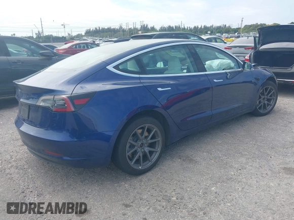 2020 Tesla Model 3 Standard Range Plus with VIN 5YJ3E1EA7LF785838, listed as a IAAI auction lot 41586081 with 38,392 mi miles and . Bid and sale history available at carsss.com. Image 4.