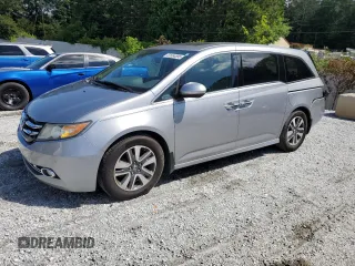 2016 Honda Odyssey Touring Elite with VIN 5FNRL5H96GB059502, listed as a Copart auction lot 57664895 with 149,714 mi miles and Salvage title. Bid and sale history available at DreamBid. Image 1.
