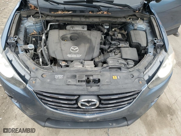 2016 Mazda CX-5 Touring with VIN JM3KE4CY9G0608152, listed as a Copart auction lot 51568775 with 142,676 mi miles and Salvage Title. Bid and sale history available at carsss.com. Image 12.