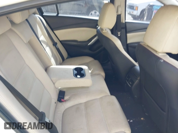 2015 Mazda 6 i Grand Touring with VIN JM1GJ1W50F1204322, listed as a IAAI auction lot 40694216 with 141,357 mi miles. Bid and sale history available at carsss.com. Image 8.