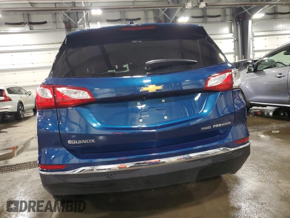 2020 Chevrolet Equinox Premier z VIN 2GNAXXEV0L6273682, wystawiony jako Copart lot #55155065 z przebiegiem 71 754 mil mil oraz Szkoda całkowita • Salvage title. Historia ofert i sprzedaży dostępna na DreamBid. Obrazek 6.