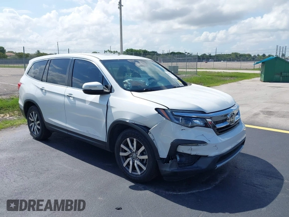 2020 Honda Pilot EX-L with VIN 5FNYF5H59LB028268, listed as a IAAI auction lot 42355620 with 107,033 mi miles and . Bid and sale history available at DreamBid. Image 1.