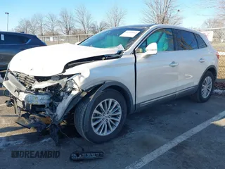 2017 Lincoln MKX Select with VIN 2LMPJ8KR5HBL34766, listed as a IAAI auction lot 41339942 with 157,186 mi miles. Bid and sale history available at carsss.com. Image 2.