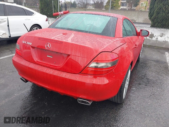 2009 Mercedes-Benz SLK-Class 3.0L with VIN WDBWK54F69F191027, listed as a IAAI auction lot 41809020 with 70,932 mi miles. Bid and sale history available at carsss.com. Image 4.