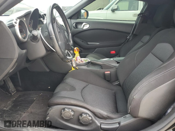2016 Nissan 370Z with VIN JN1AZ4EH8GM936468, listed as a Copart auction lot 54618544 with 60,868 mi miles and Salvage Title. Bid and sale history available at carsss.com. Image 7.