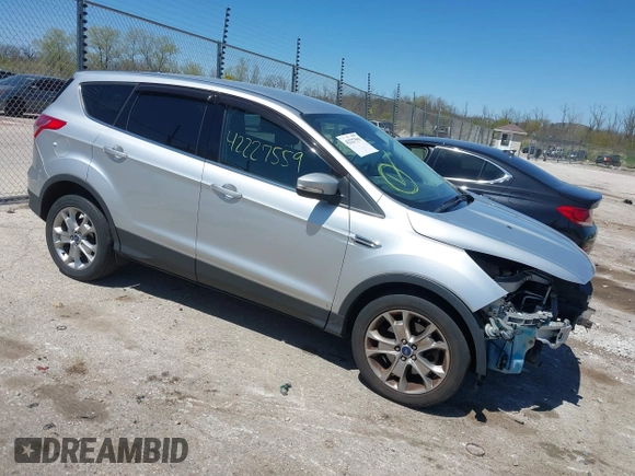 2013 Ford Escape SEL z VIN 1FMCU9H93DUA34811, wystawiony jako IAAI lot #42227559 z przebiegiem 126 495 mil mil oraz . Historia ofert i sprzedaży dostępna na DreamBid. Obrazek 1.