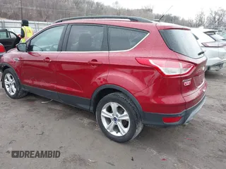 2014 Ford Escape SE with VIN 1FMCU9GX7EUC35483, listed as a IAAI auction lot 41704298 with 105,017 mi miles. Bid and sale history available at carsss.com. Image 3.