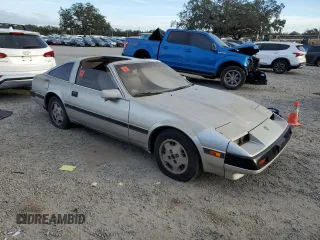 1984 Nissan 300ZX z VIN JN1HZ16S5EX016042, wystawiony jako Copart lot #86071904 z przebiegiem Nie podano mil oraz Szkoda całkowita • Salvage title. Historia ofert i sprzedaży dostępna na DreamBid. Obrazek 4.