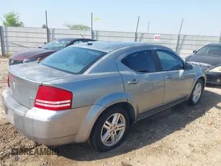 2008 Dodge Avenger SXT with VIN 1B3LC56K28N153487, listed as a IAAI auction lot 41988277 with 153,386 mi miles and . Bid and sale history available at DreamBid. Image 4.