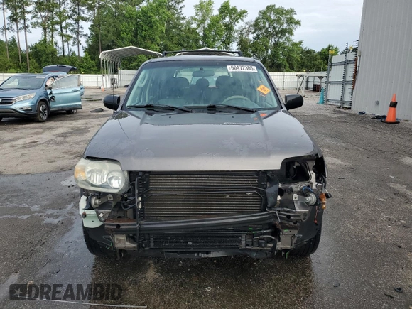 2006 Ford Escape XLS with VIN 1FMYU02Z66KA18952, listed as a Copart auction lot 60472305 with 221,258 mi miles and Salvage title. Bid and sale history available at DreamBid. Image 5.