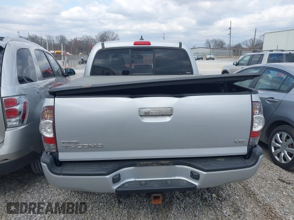 2012 Toyota Tacoma with VIN 3TMLU4ENXCM083340, listed as a IAAI auction lot 41704584 with 120,944 mi miles and . Bid and sale history available at DreamBid. Image 6.