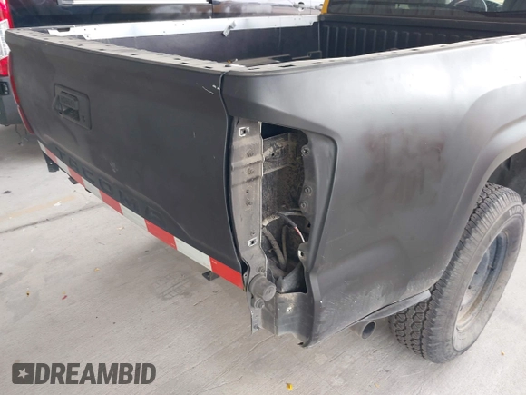 2022 Toyota Tacoma SR with VIN 3TYRX5GNXNT038474, listed as a IAAI auction lot 42090753 with 142,590 mi miles and . Bid and sale history available at DreamBid. Image 19.