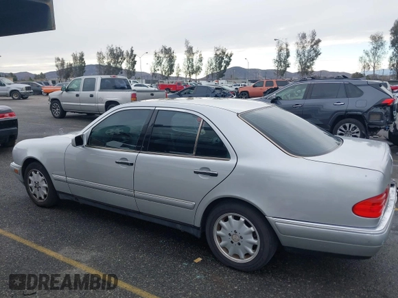 1997 Mercedes-Benz E-Class with VIN WDBJF55FXVJ033553, listed as a IAAI auction lot 41425117 with 280,019 mi miles. Bid and sale history available at carsss.com. Image 13.