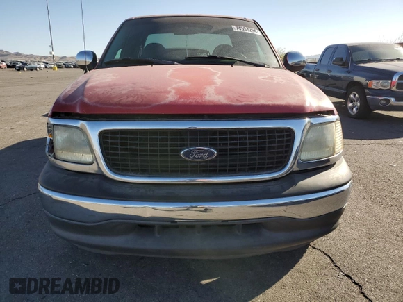 1999 Ford F-150 with VIN 1FTRX07W2XKC24186, listed as a Copart auction lot 74553294 with Not provided miles and Salvage title. Bid and sale history available at DreamBid. Image 5.