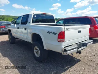 2000 Dodge Dakota Sport z VIN 1B7GG2AN2YS636449, wystawiony jako IAAI lot #42154548 z przebiegiem 186 126 mil mil oraz . Historia ofert i sprzedaży dostępna na DreamBid. Obrazek 3.