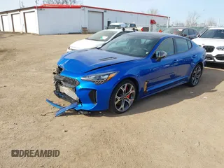 2020 Kia Stinger GT1 with VIN KNAE45LCXL6074179, listed as a IAAI auction lot 41718721 with 58,092 mi miles. Bid and sale history available at carsss.com. Image 2.