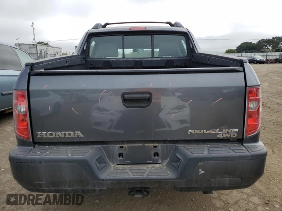 2011 Honda Ridgeline RT z VIN 5FPYK1F26BB451960, wystawiony jako Copart lot #53733215 z przebiegiem 202 556 mil mil oraz Szkody całkowita. Historia ofert i sprzedaży dostępna na DreamBid. Obrazek 6.