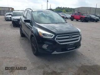 2017 Ford Escape SE with VIN 1FMCU9GD8HUB67088, listed as a IAAI auction lot 42078970 with 198,223 mi miles. Bid and sale history available at carsss.com. Image 1.