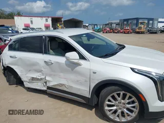 2019 Cadillac XT4 AWD Premium Luxury z VIN 1GYFZDR48KF131619, wystawiony jako IAAI lot #42202281 z przebiegiem 67 048 mil mil oraz . Historia ofert i sprzedaży dostępna na DreamBid. Obrazek 6.