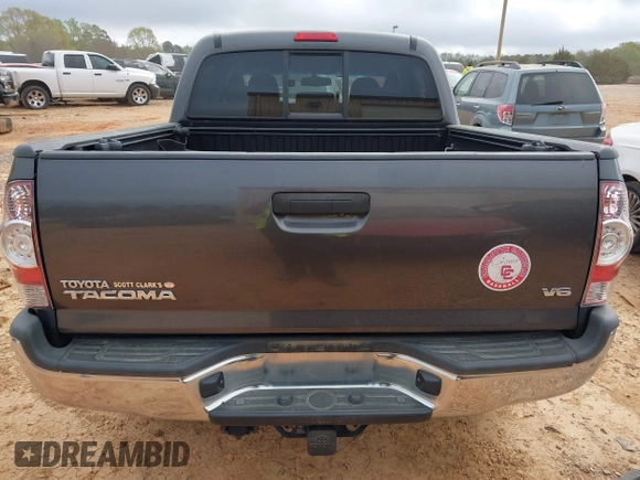 2013 Toyota Tacoma z VIN 5TFLU4EN2DX082131, wystawiony jako IAAI lot #41912420 z przebiegiem 195 334 mil mil oraz . Historia ofert i sprzedaży dostępna na DreamBid. Obrazek 16.