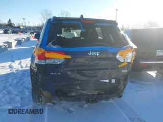 2014 Jeep Grand Cherokee Overland with VIN 1C4RJFCG1EC200570, listed as a IAAI auction lot 41301398 with 183,986 mi miles. Bid and sale history available at carsss.com. Image 6.