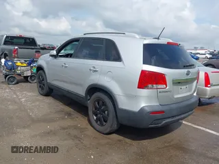 2011 Kia Sorento LX with VIN 5XYKT4A14BG074310, listed as a IAAI auction lot 42119815 with 215,660 mi miles. Bid and sale history available at carsss.com. Image 3.