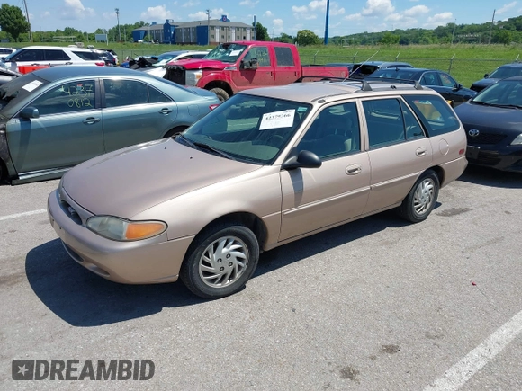 1999 Ford Escort SE z VIN 3FAFP15P9XR164302, wystawiony jako IAAI lot #42379366 z przebiegiem 111 509 mil mil oraz . Historia ofert i sprzedaży dostępna na DreamBid. Obrazek 2.