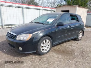 2005 Kia Spectra with VIN KNAFE161555093364, listed as a IAAI auction lot 41465930 with 190,769 mi miles. Bid and sale history available at carsss.com. Image 2.