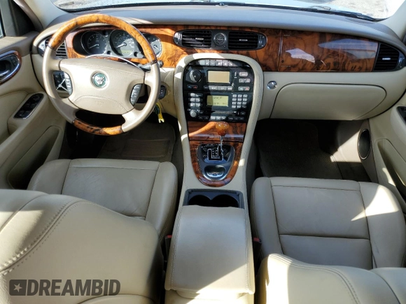 2005 Jaguar XJ with VIN SAJWA79C15SG47018, listed as a Copart auction lot 43087185 with 31,725 mi miles and Salvage Title. Bid and sale history available at carsss.com. Image 8.