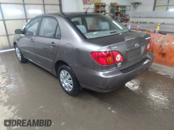2004 Toyota Corolla CE with VIN 1NXBR32E14Z204650, listed as a IAAI auction lot 41710452 with 168,099 mi miles. Bid and sale history available at carsss.com. Image 3.