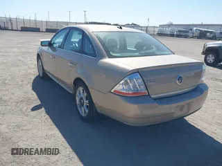 2008 Mercury Sable Premier z VIN 1MEHM42W28G609530, wystawiony jako IAAI lot #42039921 z przebiegiem 172 737 mil mil oraz . Historia ofert i sprzedaży dostępna na DreamBid. Obrazek 3.