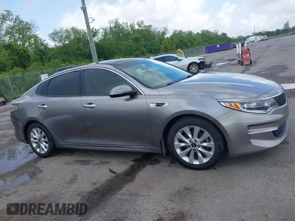 2018 Kia Optima EX with VIN 5XXGU4L36JG253629, listed as a IAAI auction lot 42079946 with 136,575 mi miles and . Bid and sale history available at carsss.com. Image 14.