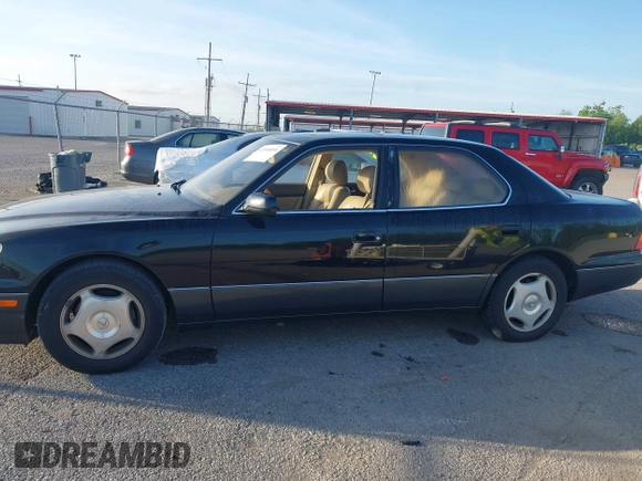 1999 Lexus LS 400 z VIN JT8BH28F4X0143726, wystawiony jako IAAI lot #42104850 z przebiegiem 184 809 mil mil oraz . Historia ofert i sprzedaży dostępna na DreamBid. Obrazek 14.