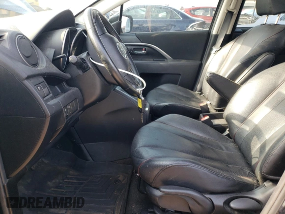 2014 Mazda 5 Grand Touring with VIN JM1CW2DL5E0174309, listed as a Copart auction lot 67900004 with 66,318 mi miles and Salvage Title. Bid and sale history available at DreamBid. Image 7.