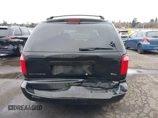 2007 Dodge Caravan SXT with VIN 1D4GP45R87B161237, listed as a IAAI auction lot 41594127 with 154,508 mi miles and . Bid and sale history available at DreamBid. Image 6.