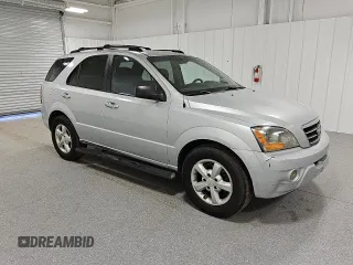 2007 Kia Sorento LX z VIN KNDJD736075700860, wystawiony jako Copart lot #82119114 z przebiegiem 290 641 mil mil oraz Czysty tytuł • Clean title. Historia ofert i sprzedaży dostępna na DreamBid. Obrazek 4.