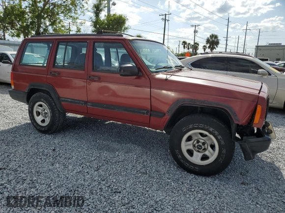 1998 Jeep Cherokee Sport with VIN 1J4FT68S4WL270134, listed as a Copart auction lot 51019695 with 246,945 mi miles and Non Repairable. Bid and sale history available at carsss.com. Image 4.