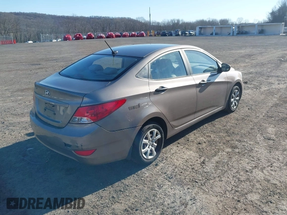 2012 Hyundai Accent GLS with VIN KMHCT4AE3CU114931, listed as a IAAI auction lot 41751304 with 166,831 mi miles. Bid and sale history available at carsss.com. Image 4.
