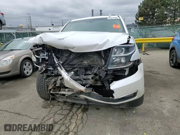 2017 Chevrolet Suburban Premier with VIN 1GNSKJKC6HR305372, listed as a Copart auction lot 47477705 with 141,324 mi miles and Salvage Title. Bid and sale history available at DreamBid. Image 12.