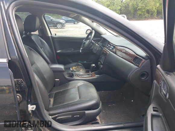 2014 Chevrolet Impala LTZ with VIN 2G1WC5E39E1103505, listed as a IAAI auction lot 42107207 with 216,544 mi miles and . Bid and sale history available at DreamBid. Image 5.