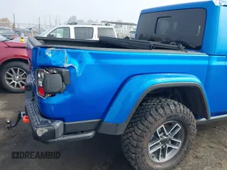 2024 Jeep Gladiator Mojave X z VIN 1C6JJTEG5RL121313, wystawiony jako IAAI lot #41013599 z przebiegiem 2 952 mil mil oraz . Historia ofert i sprzedaży dostępna na DreamBid. Obrazek 21.